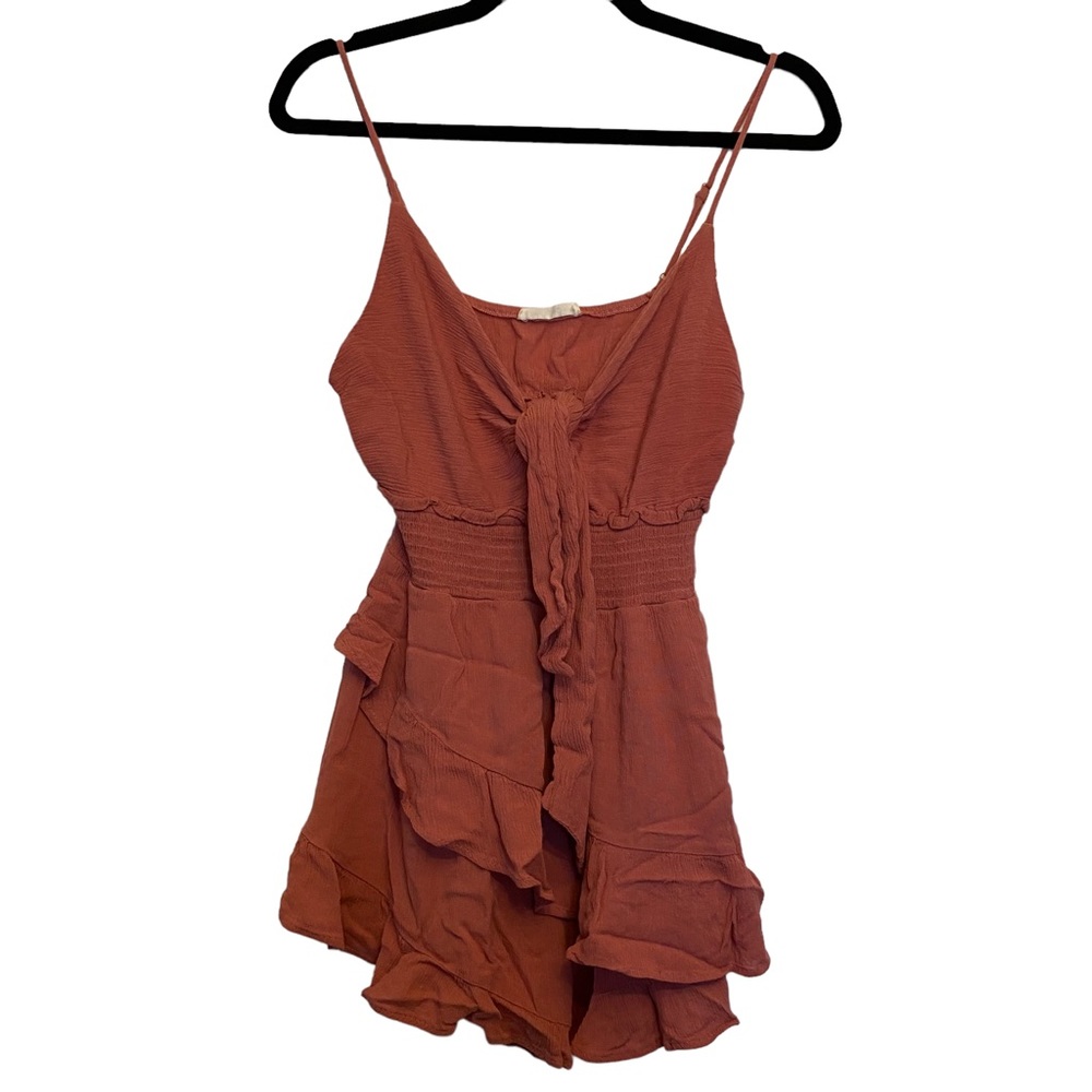 Burnt orange spaghetti strap romper, bow tie front